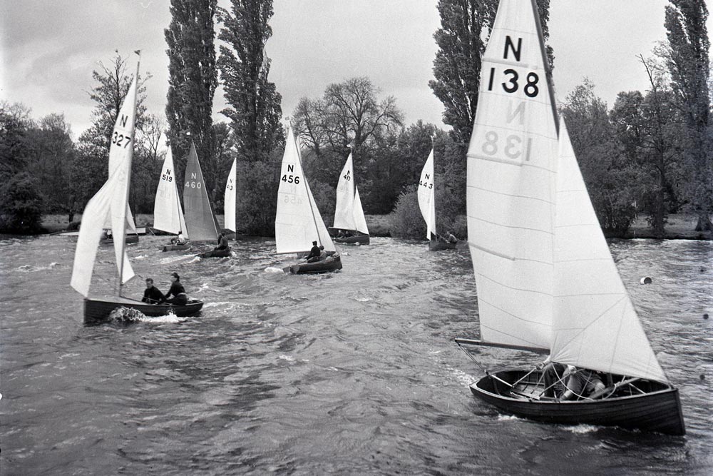 National 12 sailing dinghies on a Devon river -- one of a great series of studies of sailing off the Devon and Cornwall coasts. The National 12 is a two-person, two-sail racing dinghy