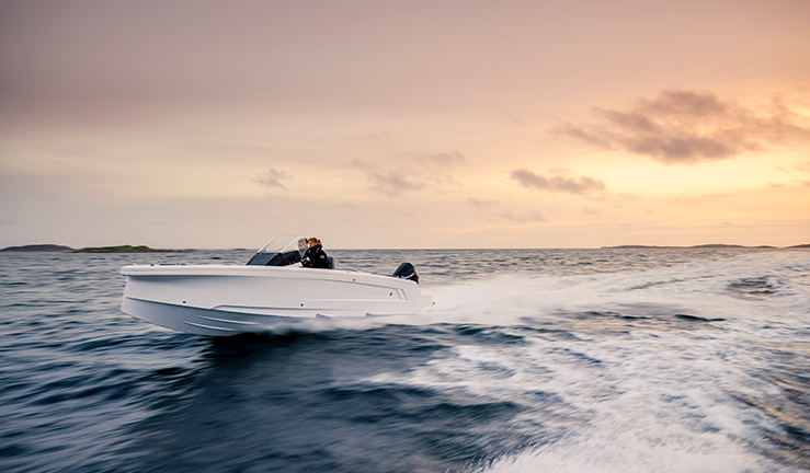 motor boats on the water - sports boat and fishing boat