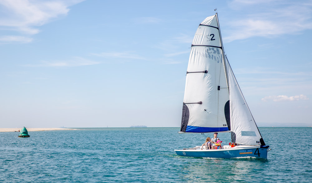 dinghy sailing on sunny day