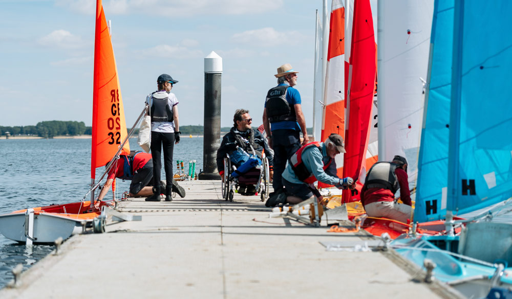 disabled sailors getting ready with rya sailability