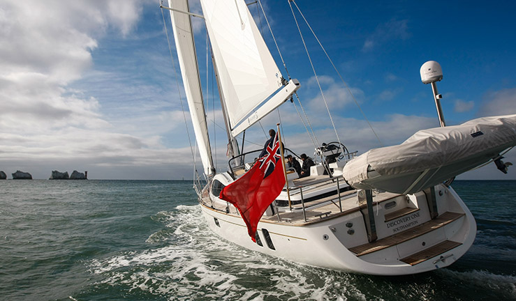 mid shot of yacht corning on the ocean