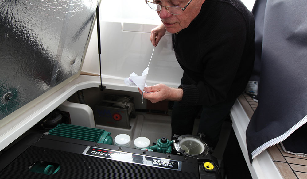 Image of man fixing engine