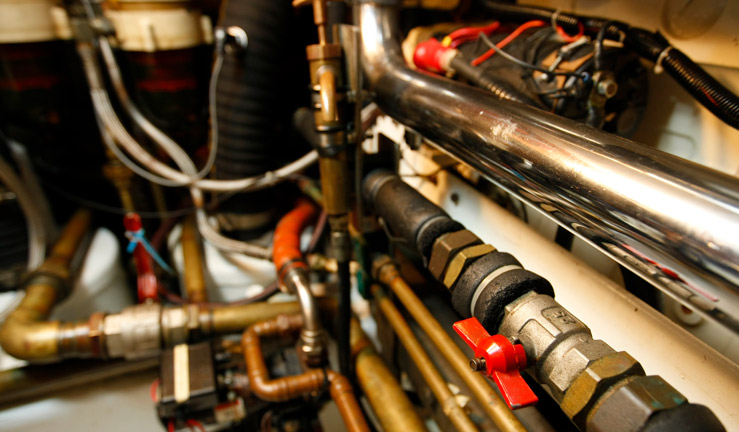 wide shot of boat engine mechanics 